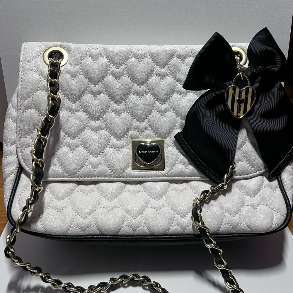 Betsey Johnson cream shoulder bag with black bow and adjustable strap